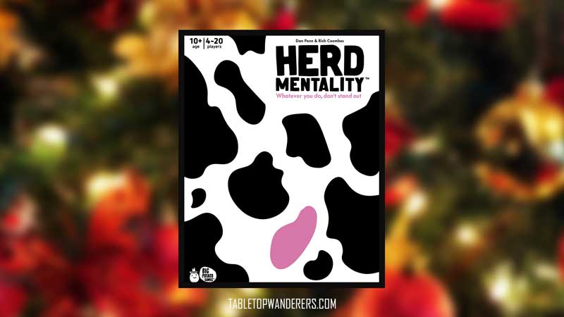 Best Christmas board games - Herd Mentality box cover on a background
