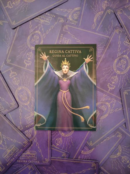 Evil Queen villain guide placed onto a bunch of facedown cards