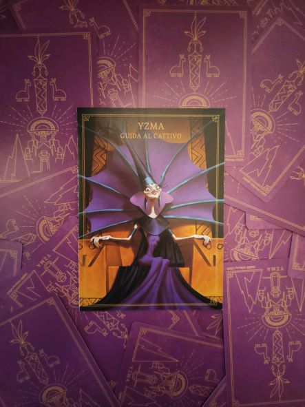 Yzma Villain Guide placed onto a bunch of facedown cards