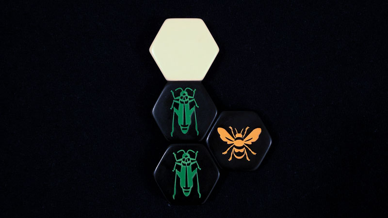 hive strategy - grasshopper, grasshopper and queen bee on a dark background
