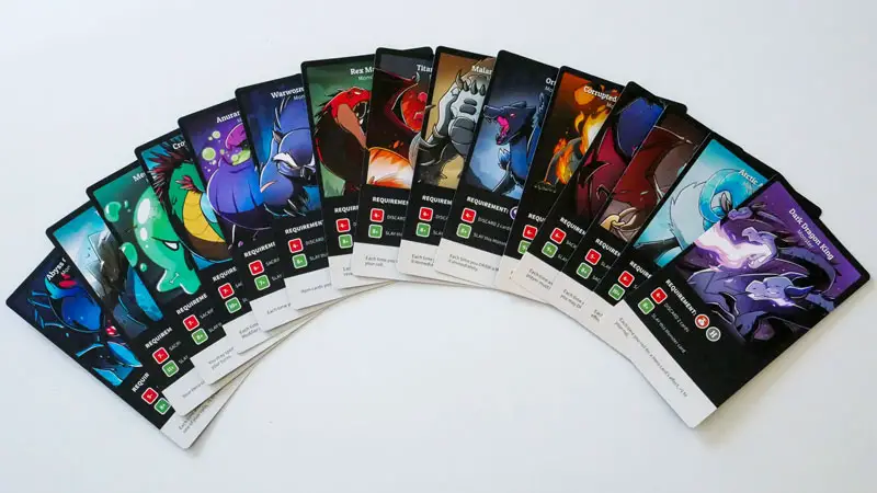 here to slay photo of the 15 monster cards on a white background