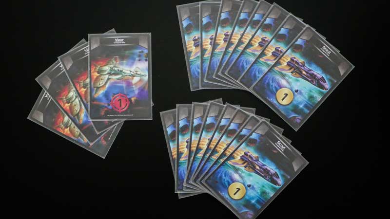 Star Realms Scout and Viper cards on a black background
