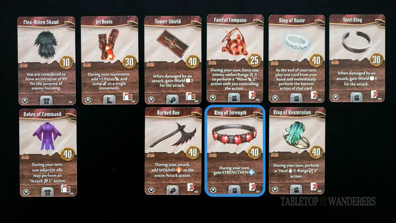Gloomhaven jaws of the lion best items from 27 to 36 on a dark background. Some have a blue rectangle shape to identify Hatchet's best items